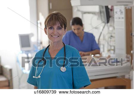 Portrait of female doctor View Large Photo Image Stock Photo - Portrait of female doctor. Fotosearch