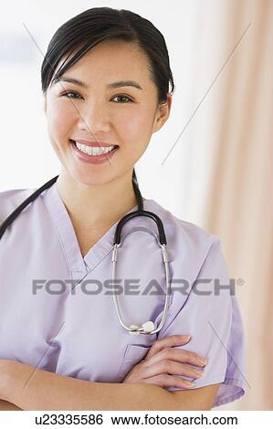 Portrait of female doctor View Large Photo Image Stock Photograph - Portrait of female doctor. Fotosearch