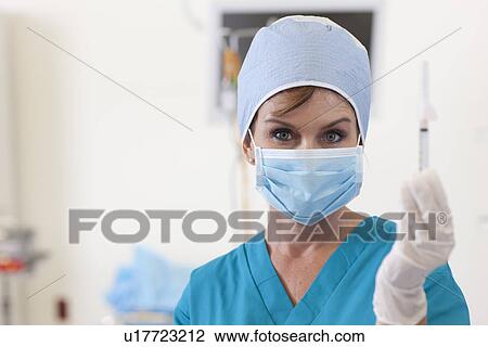 Portrait of female surgeon View Large Photo Image Stock Image - Portrait of female surgeon. Fotosearch