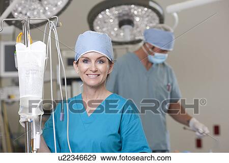 Portrait of female surgeon View Large Photo Image Stock Photo - Portrait of female surgeon. Fotosearch