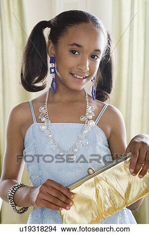 Portrait of girl (10-11) in elegant clothes View Large Photo Image Picture - Portrait of girl (10-11) in elegant clothes. Fotosearch
