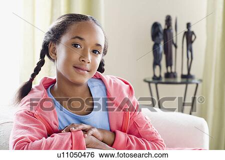 Stock Photograph - Portrait of girl (10-11). Fotosearch