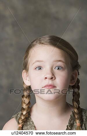 Portrait of girl (8-9) looking surprised, studio shot View Large Photo Image Stock Image - Portrait of girl (8-9) looking surprised, studio shot. Fotosearch