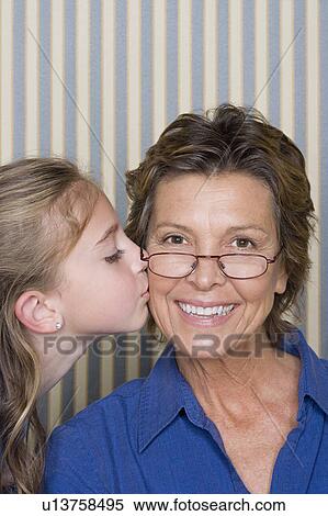 Stock Photography - Portrait of girl (8-9) with grandmother. Fotosearch