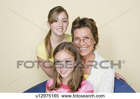 Portrait of grandmother and grand daughters (8-9, 14-15) View Large Photo Image Stock Photography - Portrait of grandmother and grand daughters (8-9, 14-15). Fotosearch