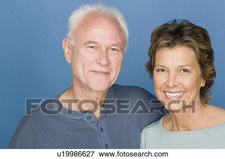 Stock Photo - Portrait of happy ageing couple. Fotosearch