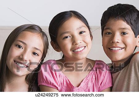 Portrait of happy children (8-9, 10-11) View Large Photo Image Stock Photography - Portrait of happy children (8-9, 10-11). Fotosearch