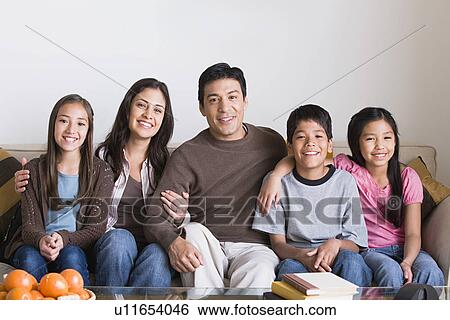 Portrait of happy family with three children (8-9, 10-11) View Large Photo Image Stock Photograph - Portrait of happy family with three children (8-9, 10-11). Fotosearch