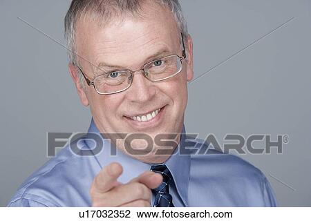 Portrait of happy mature businessman View Large Photo Image Stock Image - Portrait of happy mature businessman. Fotosearch