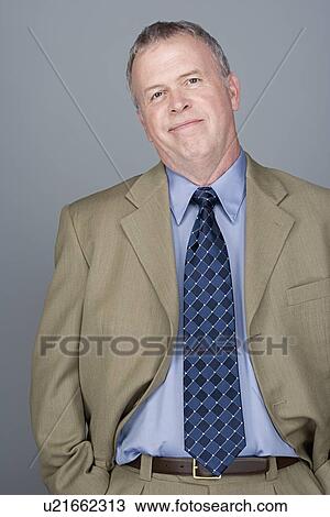 Portrait of happy mature businessman View Large Photo Image Stock Image - Portrait of happy mature businessman. Fotosearch