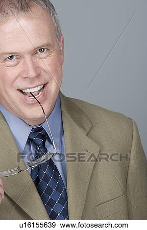 Portrait of happy mature businessman View Large Photo Image Stock Photo - Portrait of happy mature businessman. Fotosearch