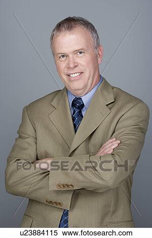 Portrait of happy mature businessman View Large Photo Image Stock Photography - Portrait of happy mature businessman. Fotosearch