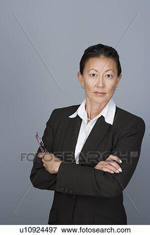 Portrait of happy mature businesswoman View Large Photo Image Stock Photo - Portrait of happy mature businesswoman. Fotosearch