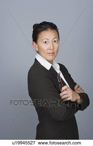Portrait of happy mature businesswoman View Large Photo Image Stock Photo - Portrait of happy mature businesswoman. Fotosearch