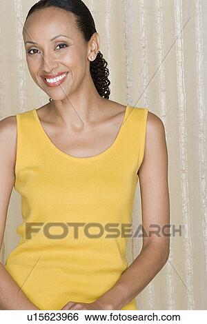 Portrait of happy mid adult african woman View Large Photo Image Stock Photograph - Portrait of happy mid adult african woman. Fotosearch