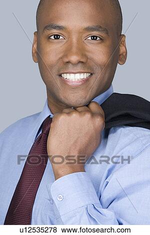 Portrait of happy mid adult businessman View Large Photo Image Stock Photo - Portrait of happy mid adult businessman. Fotosearch