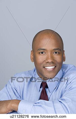 Portrait of happy mid adult businessman View Large Photo Image Stock Photograph - Portrait of happy mid adult businessman. Fotosearch