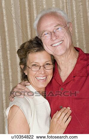 Portrait of happy mixed age couple View Large Photo Image Stock Image - Portrait of happy mixed age couple. Fotosearch
