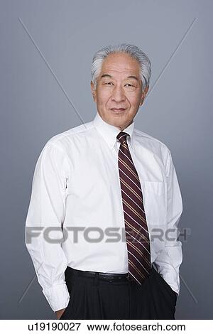 Portrait of happy senior businessman View Large Photo Image Stock Photo - Portrait of happy senior businessman. Fotosearch