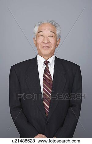 Portrait of happy senior businessman View Large Photo Image Stock Photo - Portrait of happy senior businessman. Fotosearch