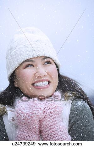 Portrait of happy woman wearing warm clothing View Large Photo Image Stock Photo - Portrait of happy woman wearing warm clothing. Fotosearch