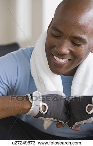 Portrait of male athlete smiling View Large Photo Image Stock Image - Portrait of male athlete smiling. Fotosearch