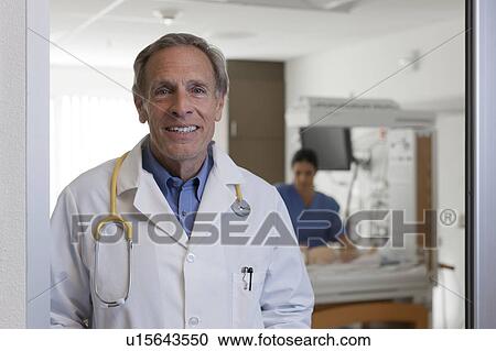 Stock Image - Portrait of male doctor. Fotosearch