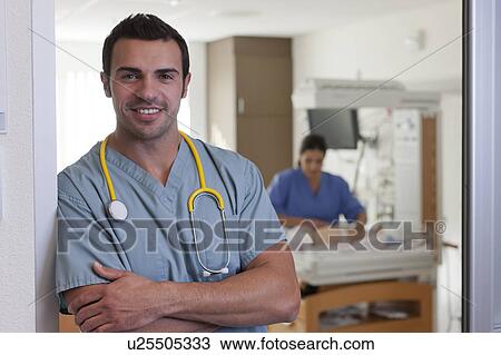 Portrait of male doctor View Large Photo Image Stock Image - Portrait of male doctor. Fotosearch