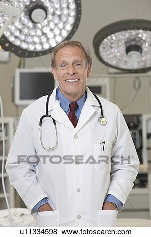 Portrait of male doctor View Large Photo Image Stock Photo - Portrait of male doctor. Fotosearch