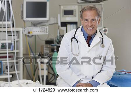 Portrait of male doctor View Large Photo Image Stock Photo - Portrait of male doctor. Fotosearch
