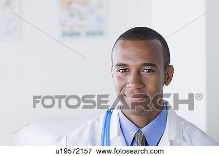Portrait of male doctor View Large Photo Image Stock Photo - Portrait of male doctor. Fotosearch