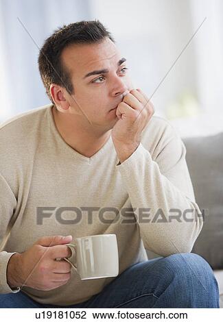 Stock Image - Portrait of man contemplating. Fotosearch