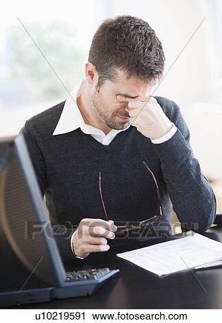 Portrait of man in office View Large Photo Image Stock Image - Portrait of man in office. Fotosearch