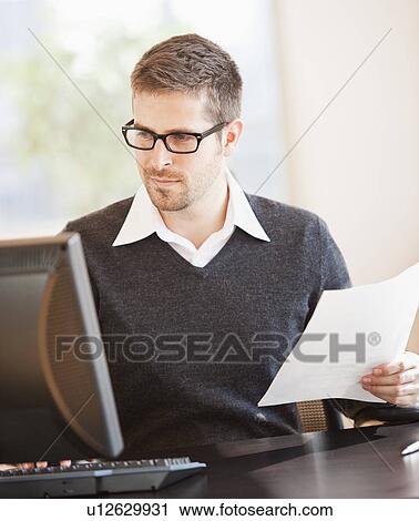 Portrait of man in office View Large Photo Image Stock Image - Portrait of man in office. Fotosearch