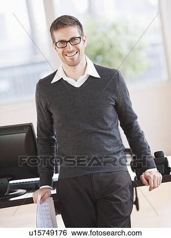 Portrait of man in office View Large Photo Image Stock Photograph - Portrait of man in office. Fotosearch