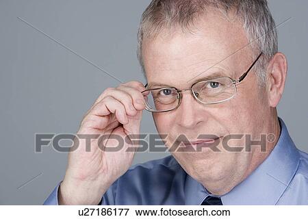 Stock Photo - Portrait of mature businessman. Fotosearch