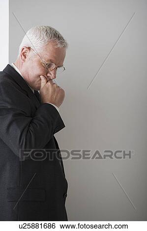 Portrait of mature businessman contemplating View Large Photo Image Stock Photograph - Portrait of mature businessman contemplating. Fotosearch