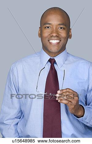 Portrait of mid adult businessman View Large Photo Image Stock Photography - Portrait of mid adult businessman. Fotosearch