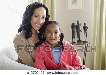 Stock Photo - Portrait of Mother and Daughter (10-11). Fotosearch