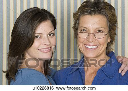 Portrait of mother with adult daughter View Large Photo Image Stock Photograph - Portrait of mother with adult daughter. Fotosearch
