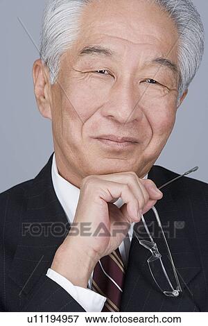 Stock Photo - Portrait of senior businessman. Fotosearch