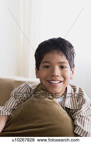 Portrait of smiling boy (10-11) View Large Photo Image Stock Photo - Portrait of smiling boy (10-11). Fotosearch