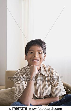 Stock Photography - Portrait of smiling boy (10-11). Fotosearch