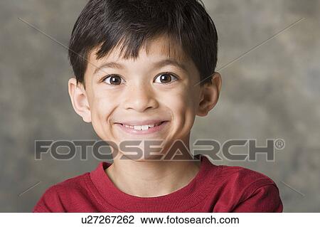 Portrait of smiling boy (8-9), studio shot View Large Photo Image Stock Image - Portrait of smiling boy (8-9), studio shot. Fotosearch
