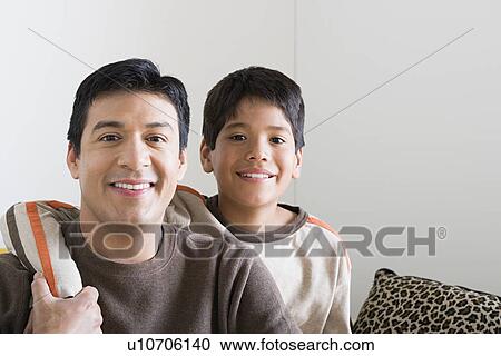 Portrait of smiling father and son (10-11) View Large Photo Image Stock Image - Portrait of smiling father and son (10-11). Fotosearch