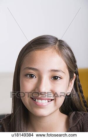 Portrait of smiling girl (10-11) View Large Photo Image Picture - Portrait of smiling girl (10-11). Fotosearch