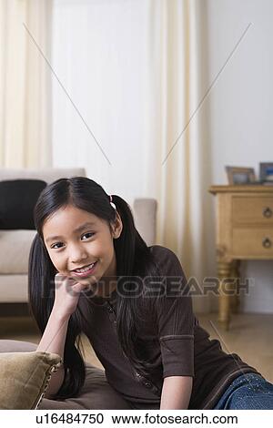 Portrait of smiling girl (8-9) View Large Photo Image Stock Image - Portrait of smiling girl (8-9). Fotosearch