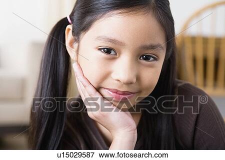 Portrait of smiling girl (8-9) View Large Photo Image Stock Photo - Portrait of smiling girl (8-9). Fotosearch
