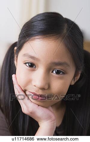 Portrait of smiling girl (8-9) View Large Photo Image Stock Photograph - Portrait of smiling girl (8-9). Fotosearch