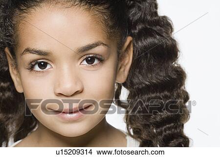 Portrait of smiling girl (8-9), studio shot View Large Photo Image Picture - Portrait of smiling girl (8-9), studio shot. Fotosearch